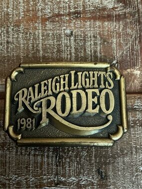 Raleigh Lights Rodeo 1981 Brass Belt Buckle
